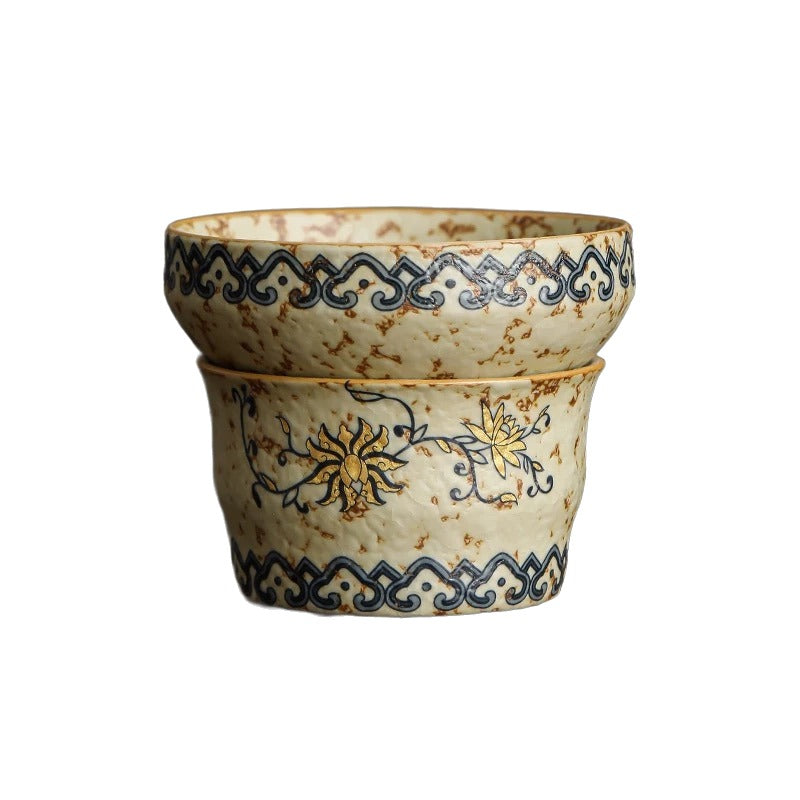 Teacup and tea strainer set